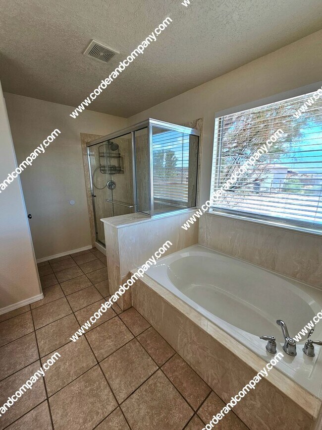 Building Photo - Custom 3 Bedroom, 2 Bathrooms, 2 Car Garage and 2,212 Sq Ft. Home with Beautiful Sandia Mountain ...