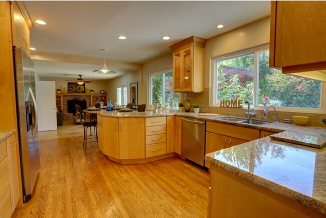 Building Photo - Executive 5BR Home with Private Backyard Retreat