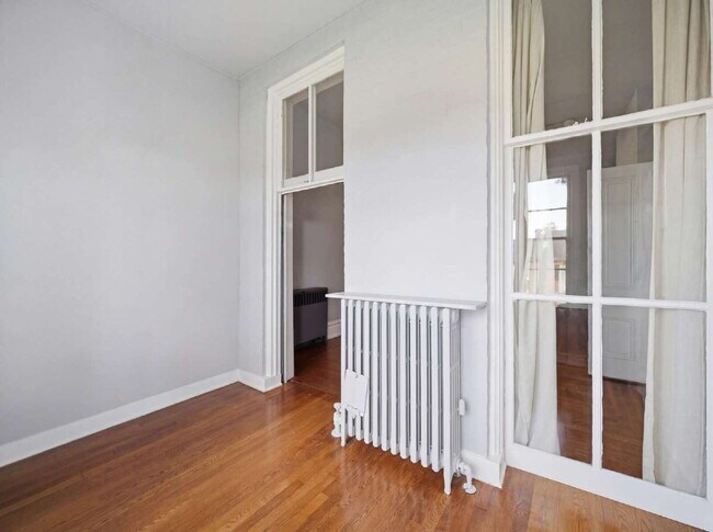 Building Photo - Charming 2-Bedroom, 1-Bath First-Floor Residence in a Beautifully Renovated Historic Home