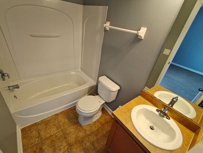 Building Photo - Spacious 2-Bed, 2.5-Bath Townhome with Gar...