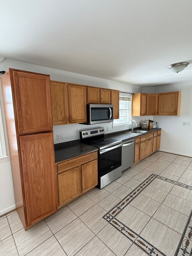 Building Photo - Beautiful 3BR Home with Garage, Finished Walk-Out Basement & Bonus Spaces- Beltsville, MD