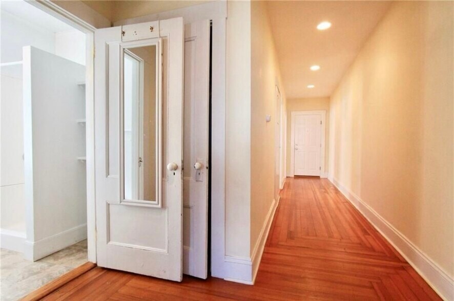 Hallway looking into bathroom - 23 Bedlow Ave