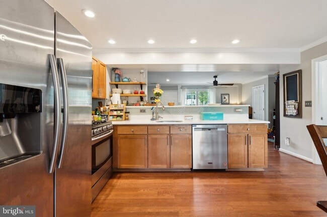 Building Photo - Welcome to this beautifully updated three ...
