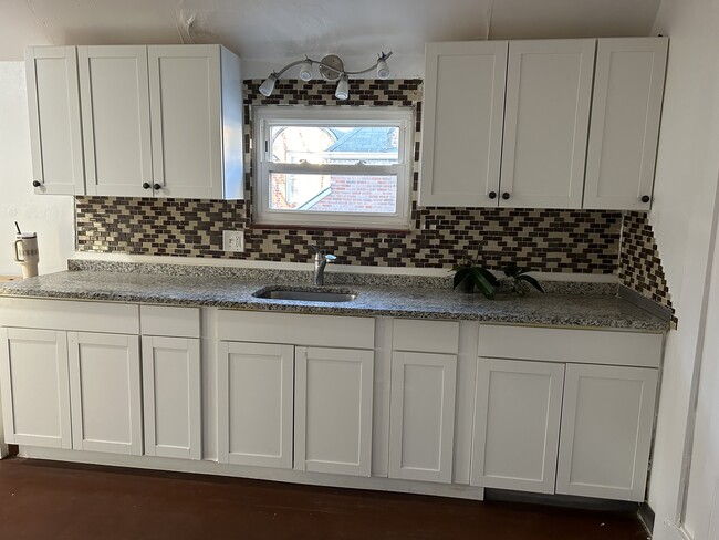 New cabinets granite countertops deep stainless steel sink - 724 Huntington Rd