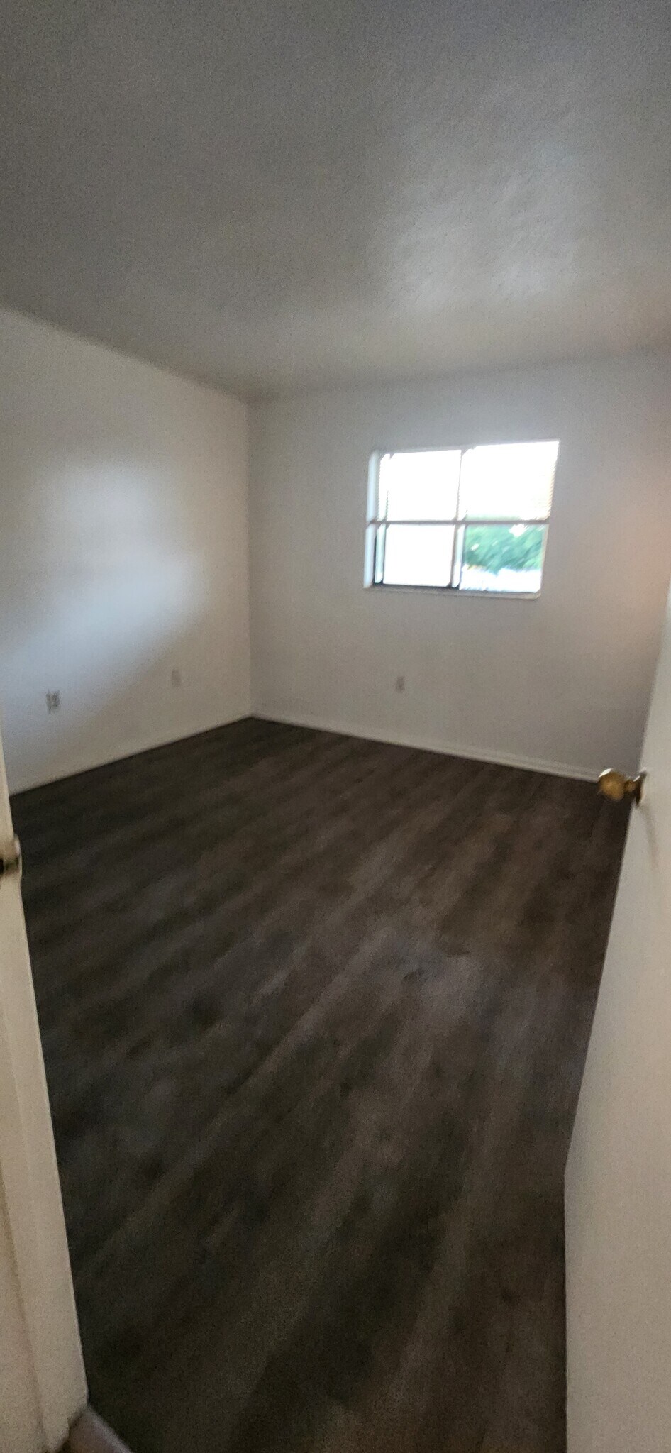 New vinyl floor in bedroom 2 - 1552 University Ln