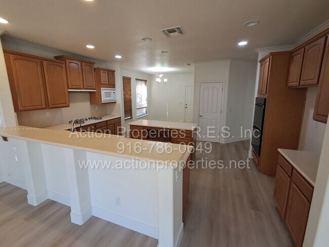 Building Photo - Action Properties R.E.S. Inc. Offering Beautiful Highland Park Single Story 3 Car, 4 Bedroom, Gar...