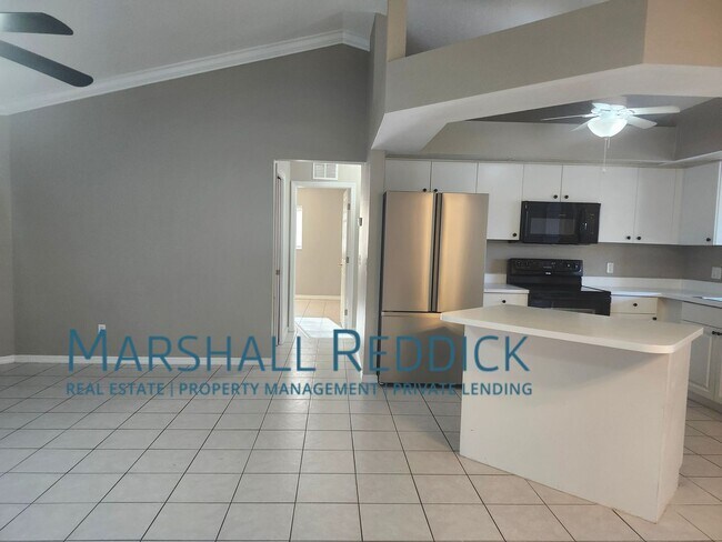 Building Photo - 3 BED 2 BATH SINGLE FAMILY HOME ON FRESH WATER CANAL WITH DOCK