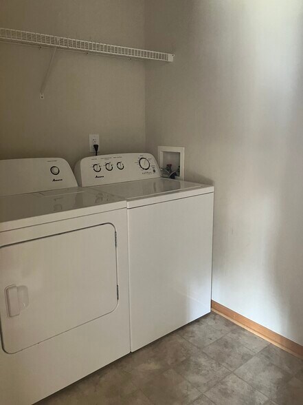 upstairs laundry - 906 SE Crossings Ln