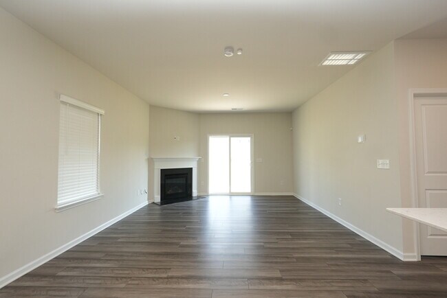 Building Photo - Spacious 4-Bedroom Home with Modern Comforts