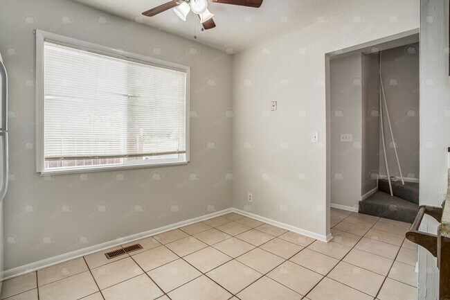 Building Photo - **Spacious 3-Bedroom Townhome with Partial...