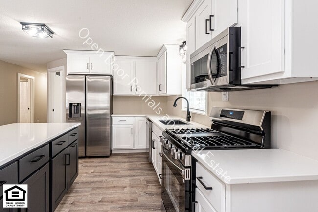 Building Photo - 4 bedroom home now available!