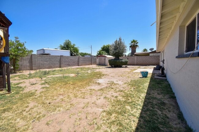 Building Photo - 6819 N 64th Ave