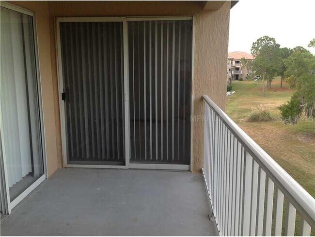 Building Photo - 14037 Fairway Island Dr
