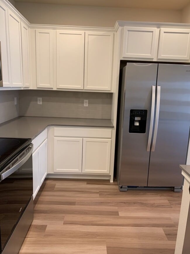 Building Photo - 3 Bed / 2.5 Bath Townhome with Attached Garage in NE Ft. Collins