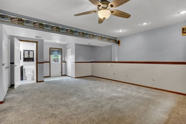 Building Photo - Spacious 4-Level Home with Deck, Workshop ...