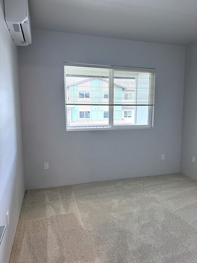 Building Photo - Kapili - Brand new two bedroom, two bath townhome with Garage