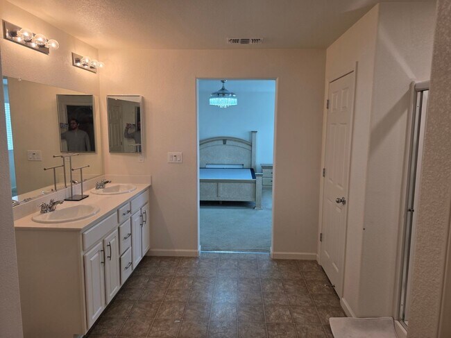 Building Photo - Spacious 5BR + Loft in Hamptons Village – Studio Suite, New HVAC, EV Charging