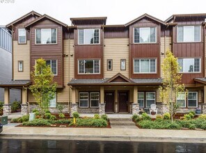 Building Photo - Neat and Tidy Newer Town Home with Two Master Bedrooms and Den on the Main Level