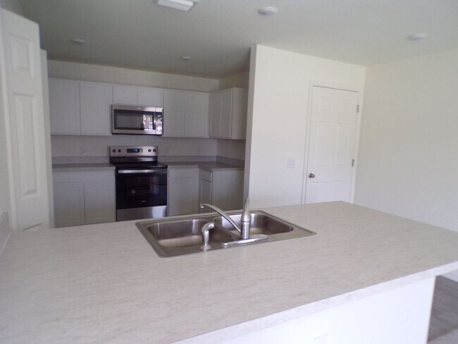 Building Photo - BRAND NEW HOME READY TO RENT ANNUALLY