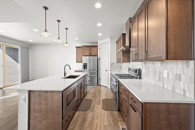 Building Photo - New-Build Paired Home with Dual Primary Suites, Finished Basement & Mountain Views