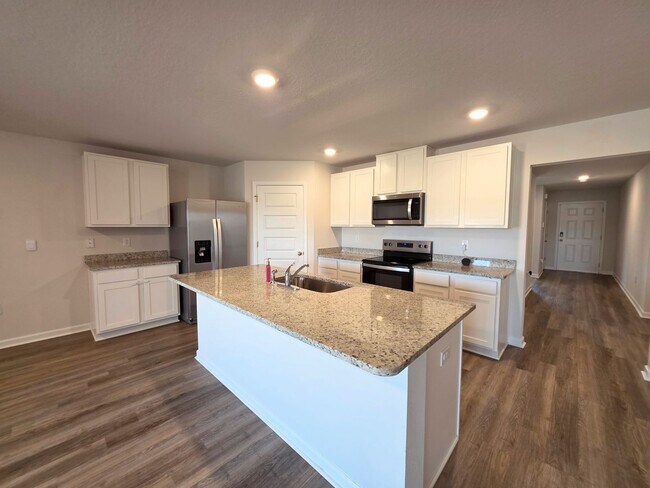 Building Photo - Nearly New 4BR/2BA home close to I10 with energy savings built in