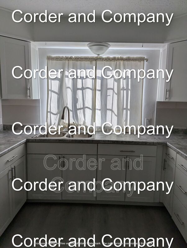 Building Photo - 211-1211 Adams St NE