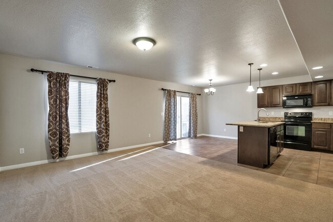 Building Photo - Pet Friendly Townhome w attached 2 car garage