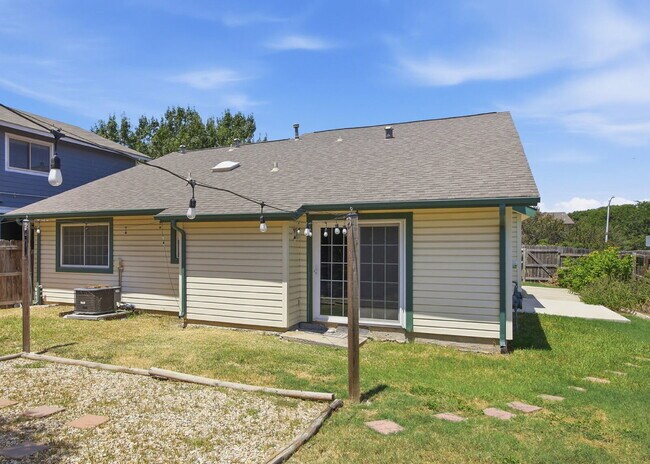 Building Photo - Corner-Lot Garden Home with a Private Patio.