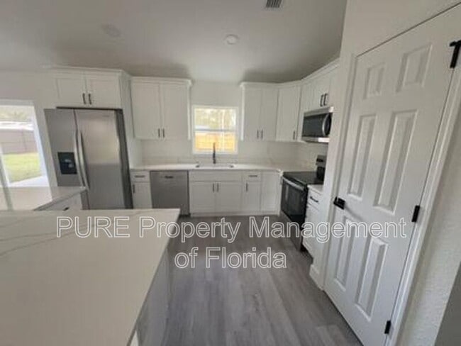 Building Photo - 5787 NW 62nd Ave
