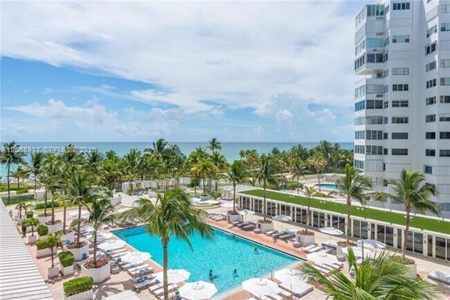 Building Photo - 10275 Collins Ave