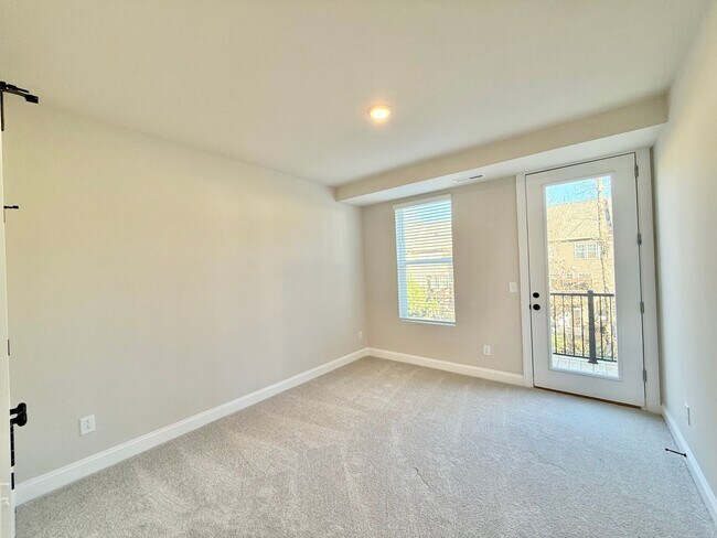 Building Photo - Stunning New Construction 2BD, 2.5BA Cary Townhome-Style Condo with a 1-Car Garage & Bonus Flex S...