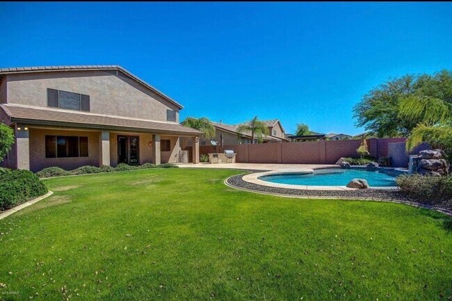 Building Photo - Stunning 4BR House in Phoenix with sparkling pool, resort style backyard and solar panles