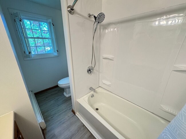 Building Photo - Two Bedroom Duplex with Heat Included! Nea...