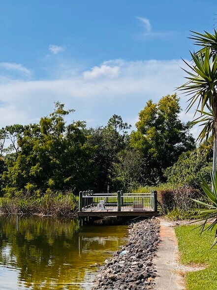 The dock area offers beautiful views, perfect for enjoying the scenery - 9570 Green Cypress Ln