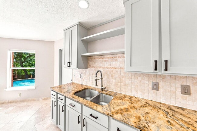 Building Photo - Your Own Private Backyard Resort Awaits w/ An In Ground Pool!