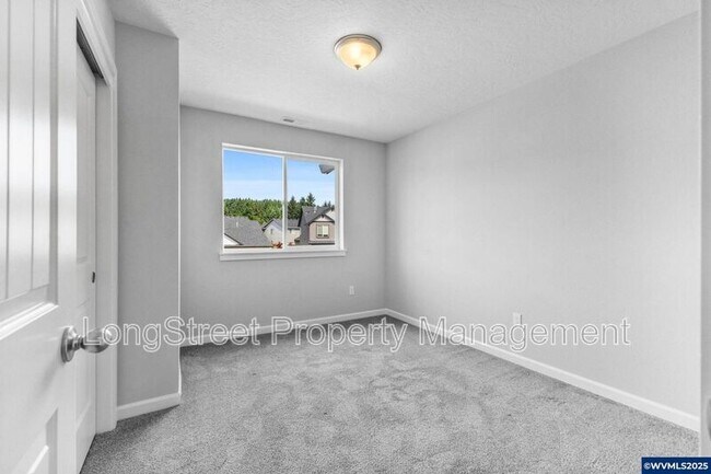 Building Photo - 7177 SE Sarah Dr