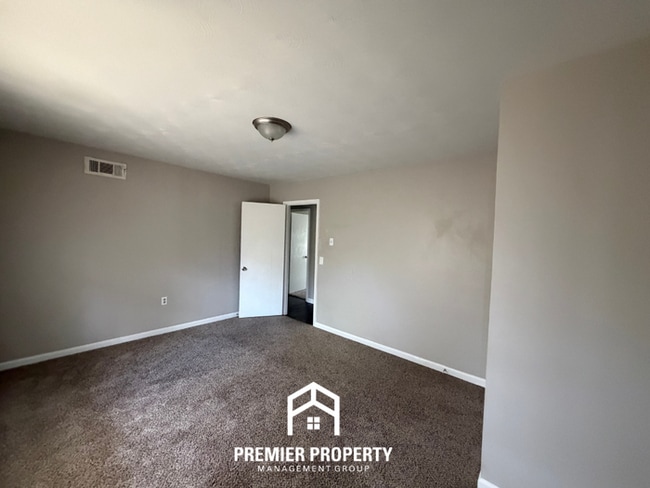 Building Photo - Spacious 4BR/2BA Home in Bartlett Cove | Brick Fireplace & Formal Dining