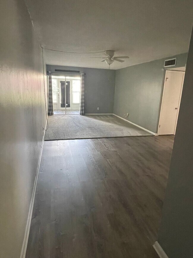Building Photo - 55+ Charming first-floor condo nestled in ...