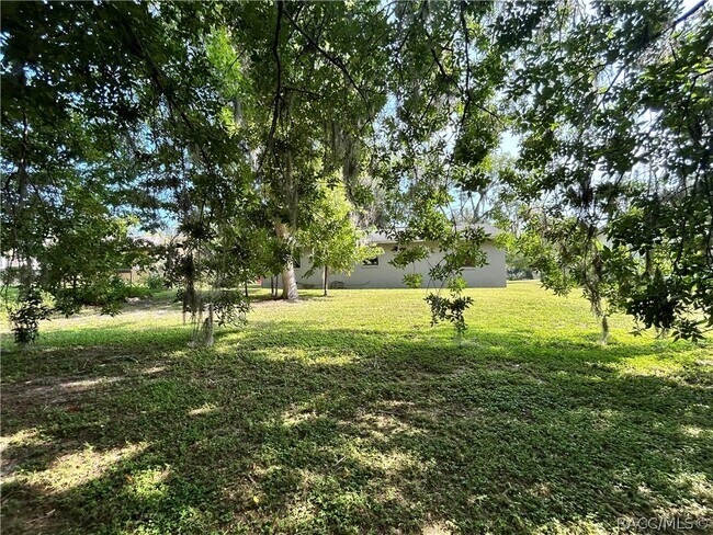 Building Photo - 7236 E Oak Isle Dr