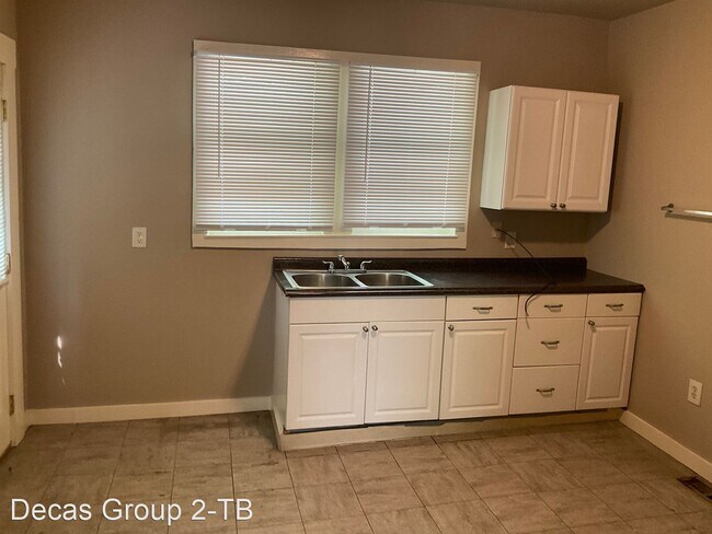 Building Photo - 3 br, 1 bath House - 125 20th Avenue NE