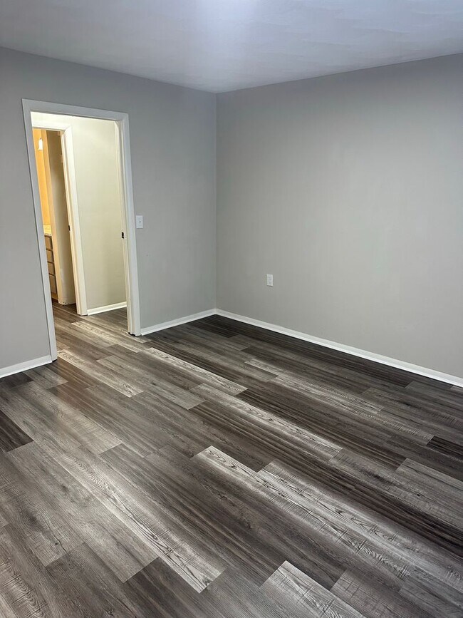 Building Photo - Oversized 3 Bedroom with laundry room!