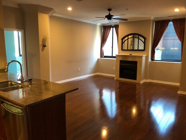 Open living room with hard woods. - 225 N New Jersey St