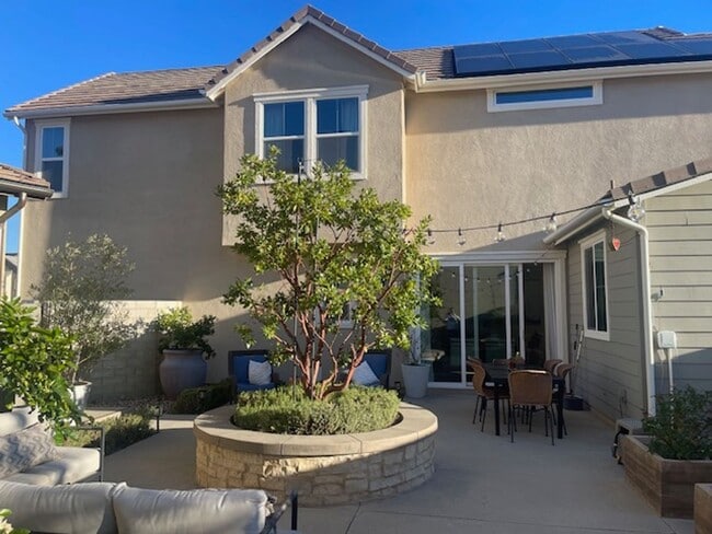 Building Photo - Newer 4BR Valencia Home in Solaire | Pool Community | Prime Location