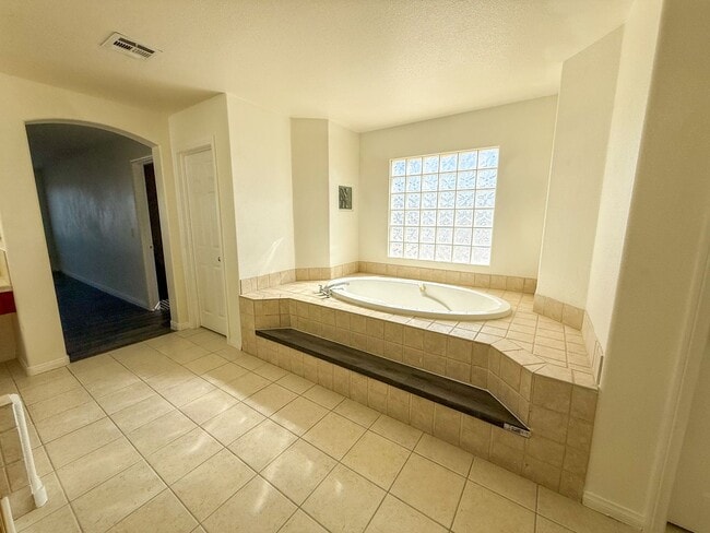 Building Photo - SPACIOUS HOME IN GATED COMMUNITY WITH POOL, RV PARKING & 4-CAR GARAGE!