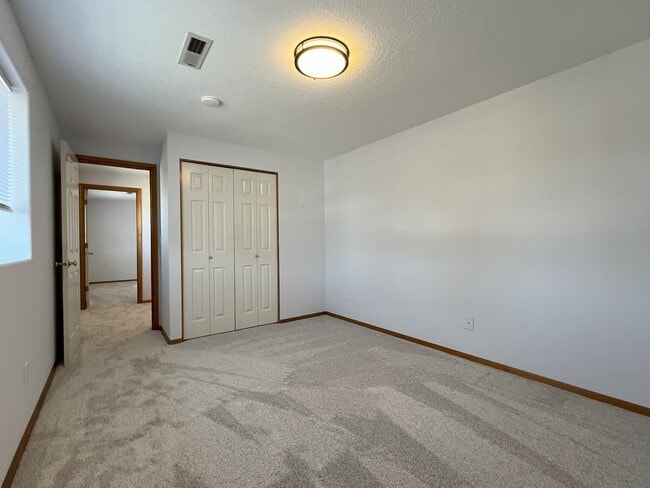 Building Photo - Spacious 4-Bedroom, 2.5-Bathroom Home with...