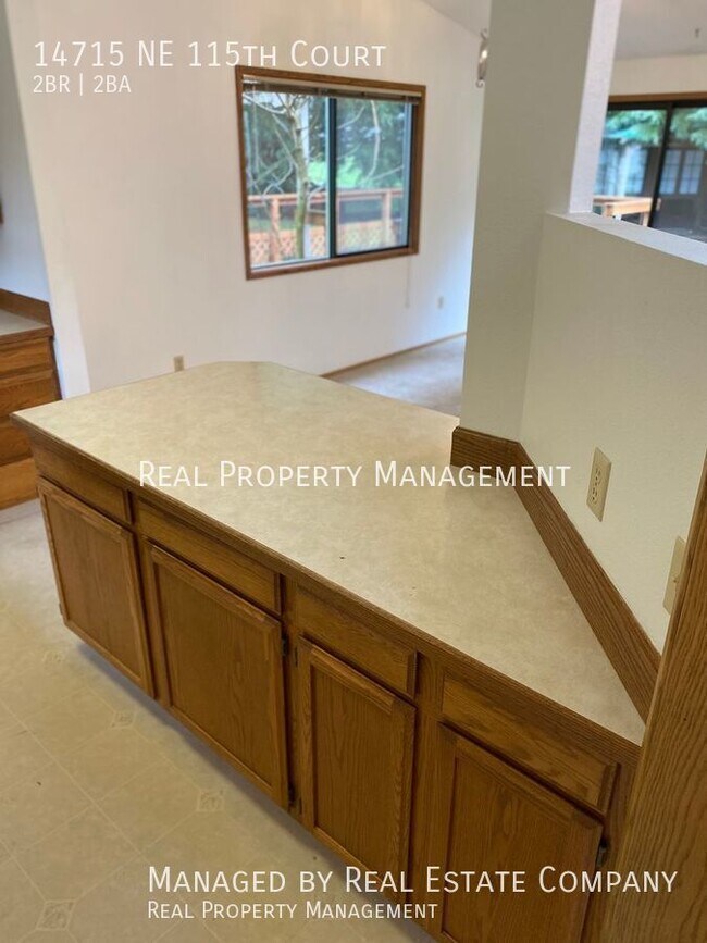 Building Photo - Ranch Style Brush Prairie Home with Large ...