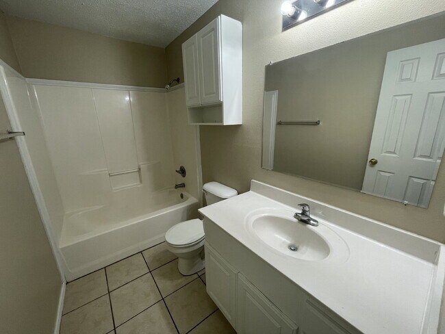 Building Photo - Downstairs Quad Located West of Frankford Near WallMart & W. Loop 289!