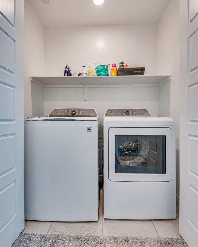 Building Photo - Furnished 3-bedroom, 2.5-bath townhome, designed to offer the ultimate in modern comfort.