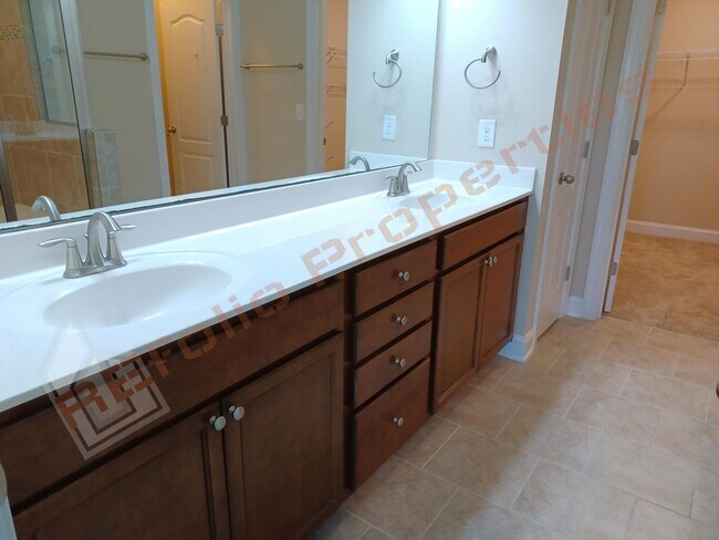 Building Photo - Luxury 5 Bedroom, 3 Bath, 2-Car Garage End Unit Townhouse w/1st level Primary Suite + Guest Suite...