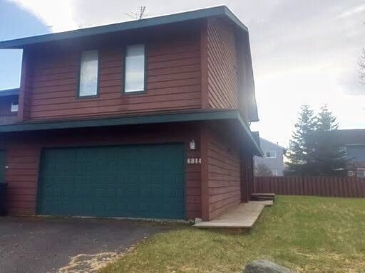 Building Photo - Spacious East Anchorage Home with Yard & Garage!